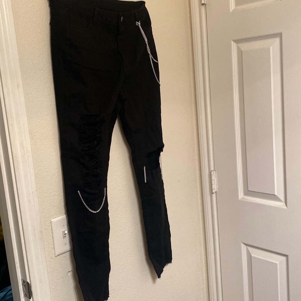 Dark black ripped jeans